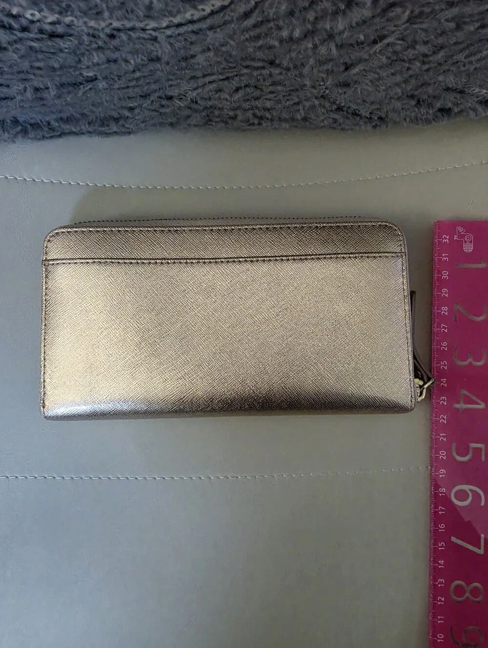 Kate Spade metallic rose wallet in rose gold